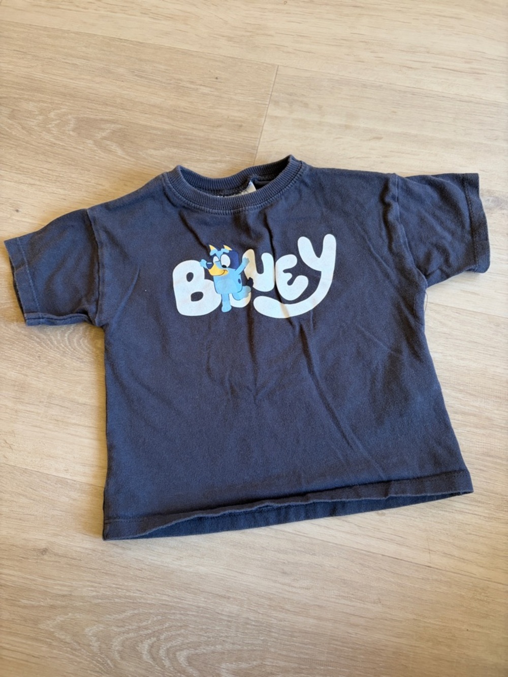 Zara Navy Short Sleeve Tee with White Logo and Blue Character